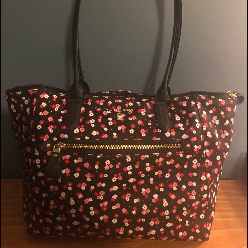 Michael Kors canvas shoulder bag.